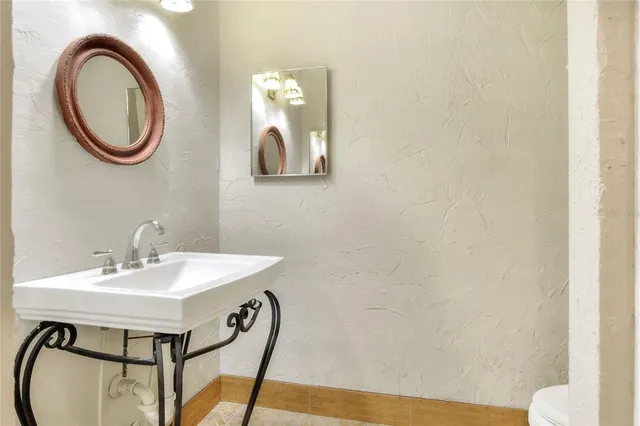 a view of hallway with wooden floor