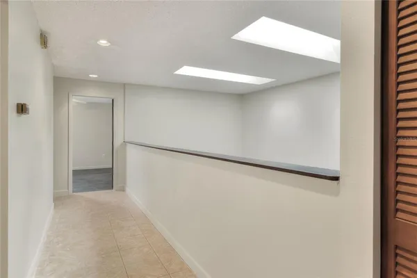 an empty room with a bathroom
