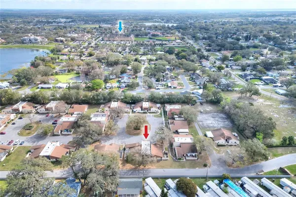 an aerial view of residential houses with outdoor space