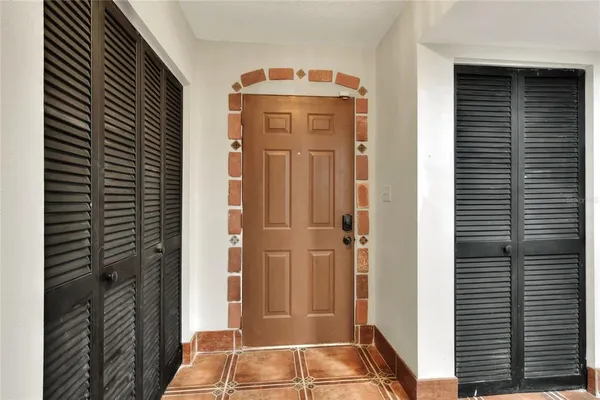 a view of front door with stairs