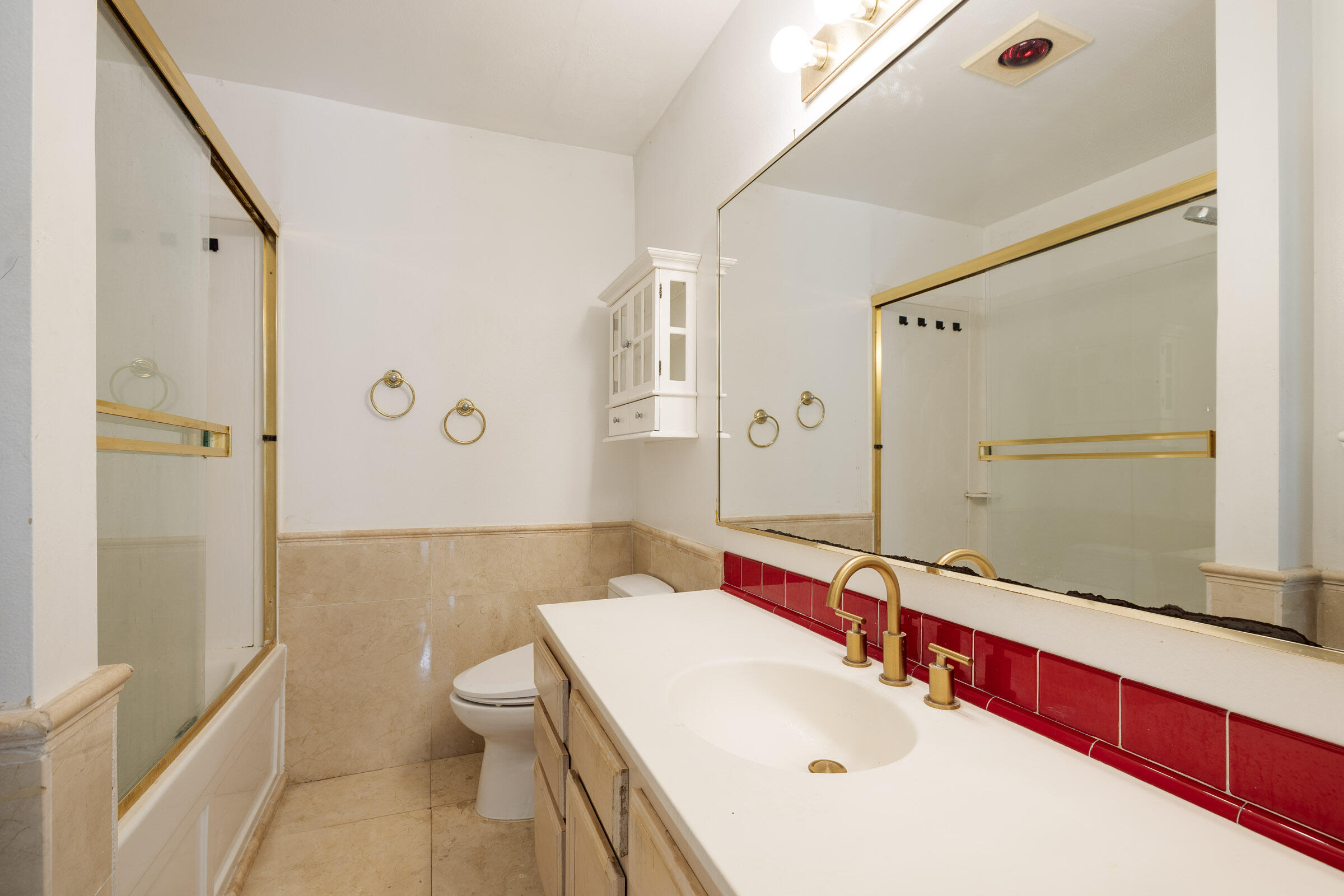 29 Dearborn Place, Unit 7 Goleta, CA 93117 - Photo 18 of 25 a bathroom with a sink a toilet and shower