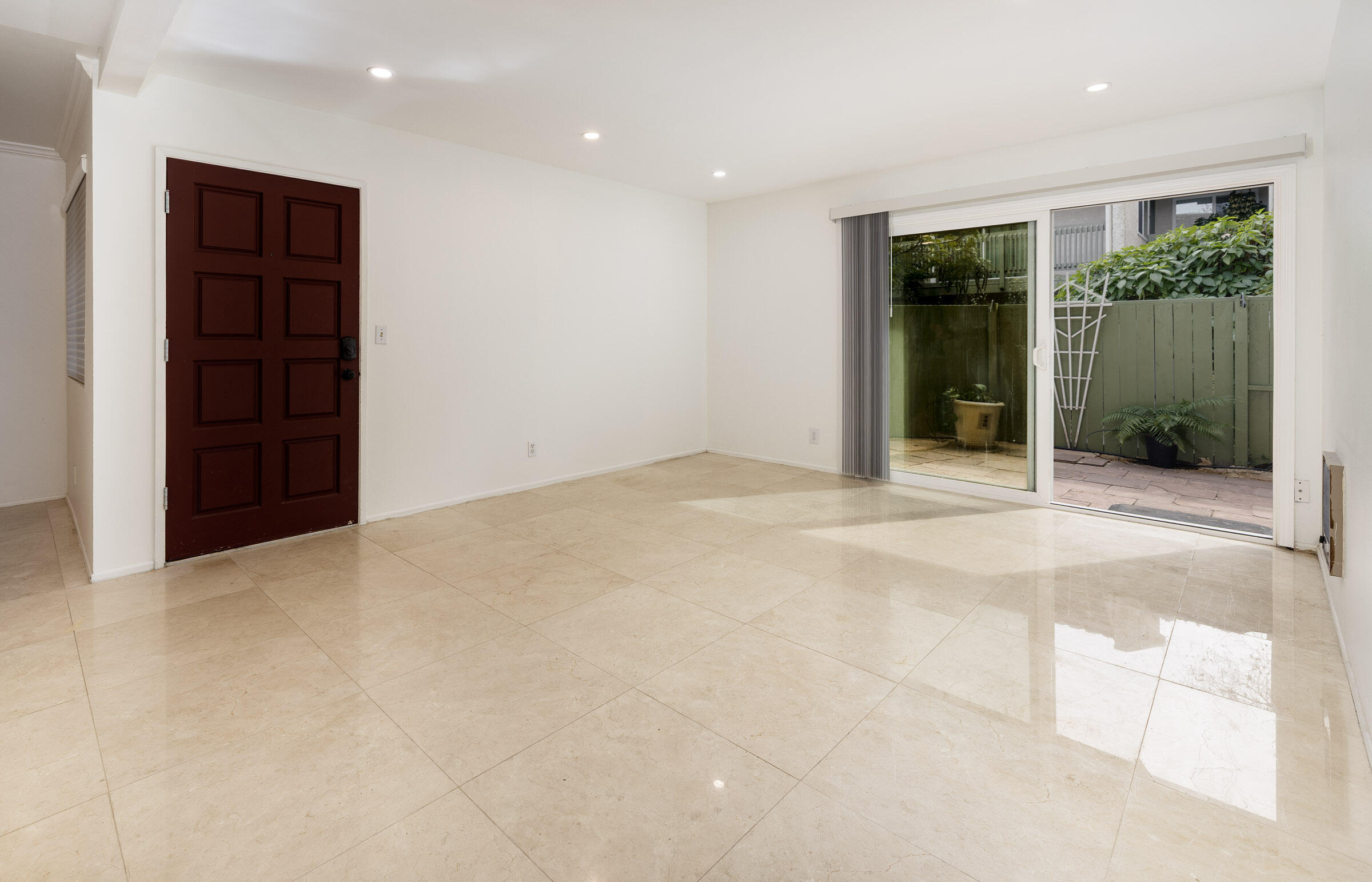 29 Dearborn Place, Unit 7 Goleta, CA 93117 - Photo 2 of 25 a view of an empty room with glass door