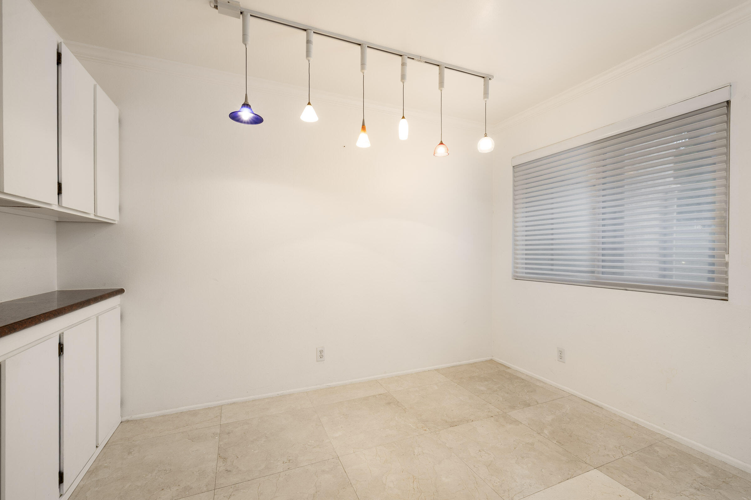 29 Dearborn Place, Unit 7 Goleta, CA 93117 - Photo 8 of 25 an empty room with kitchen view