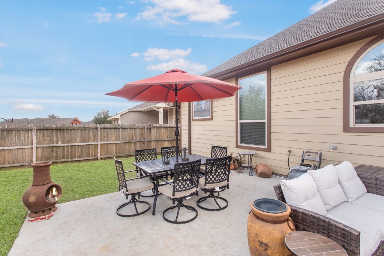 15416 Baker Meadow Loop College Station, TX 77845 - Photo 13 of 26 a view of a chairs and table in the patio