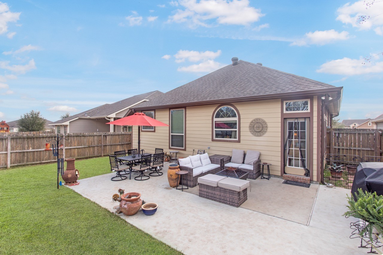 15416 Baker Meadow Loop College Station, TX 77845 - Photo 16 of 26 a view of a house with backyard and sitting area