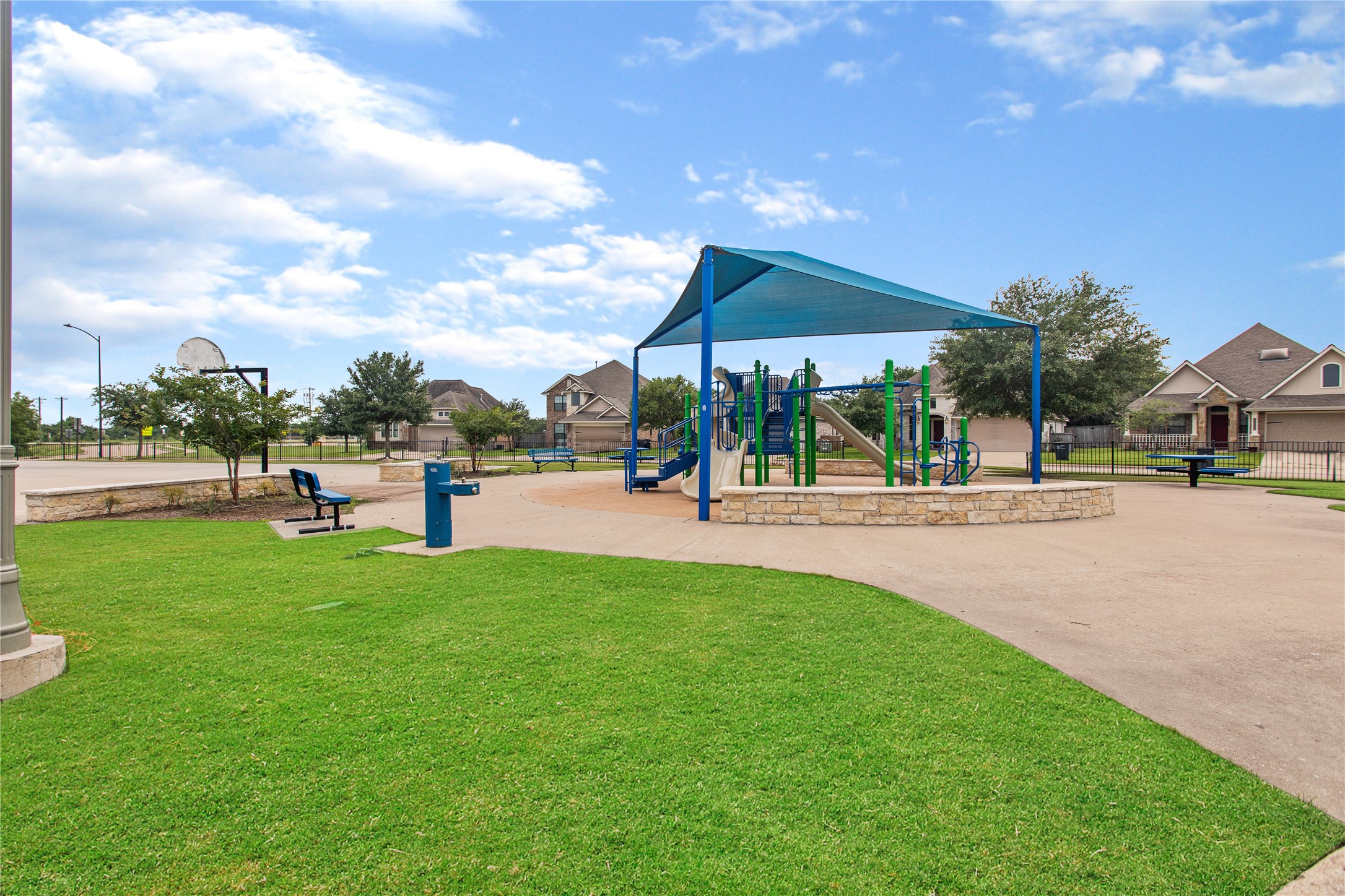 15416 Baker Meadow Loop College Station, TX 77845 - Photo 24 of 26 a view of park and bench