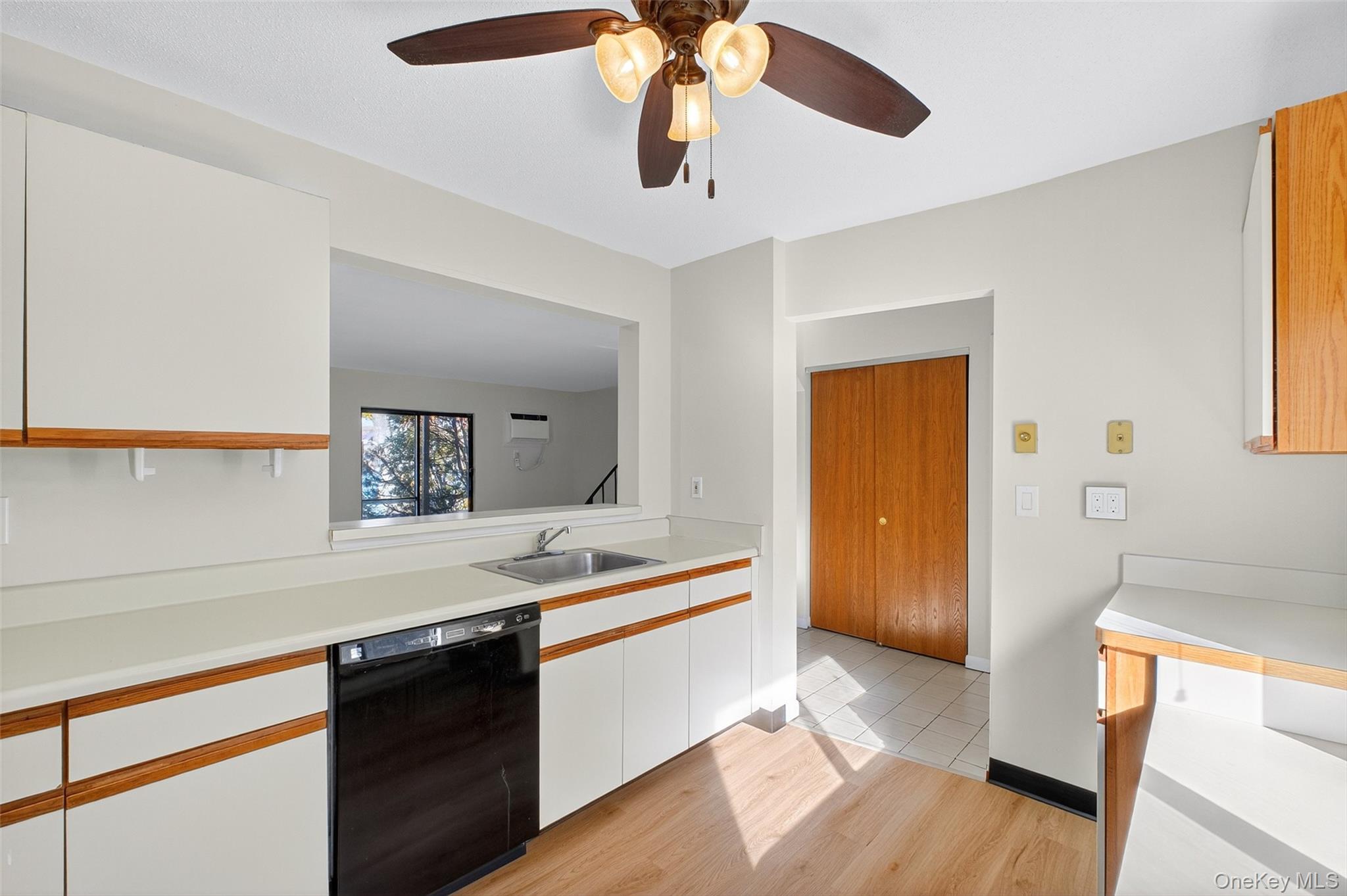 28 Hudson Heights Drive, Unit 28 Poughkeepsie, NY 12601 - Photo 16 of 50 a hallway with a sink and a stove top oven