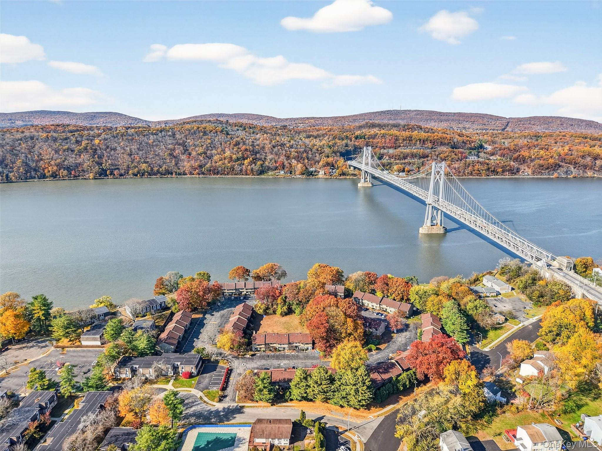 28 Hudson Heights Drive, Unit 28 Poughkeepsie, NY 12601 - Photo 45 of 50 an aerial view of a houses with a lake