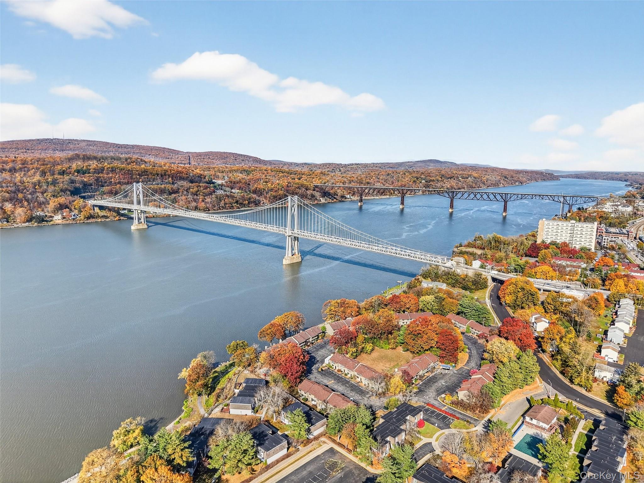 28 Hudson Heights Drive, Unit 28 Poughkeepsie, NY 12601 - Photo 46 of 50 a view of a lake with mountains in the background