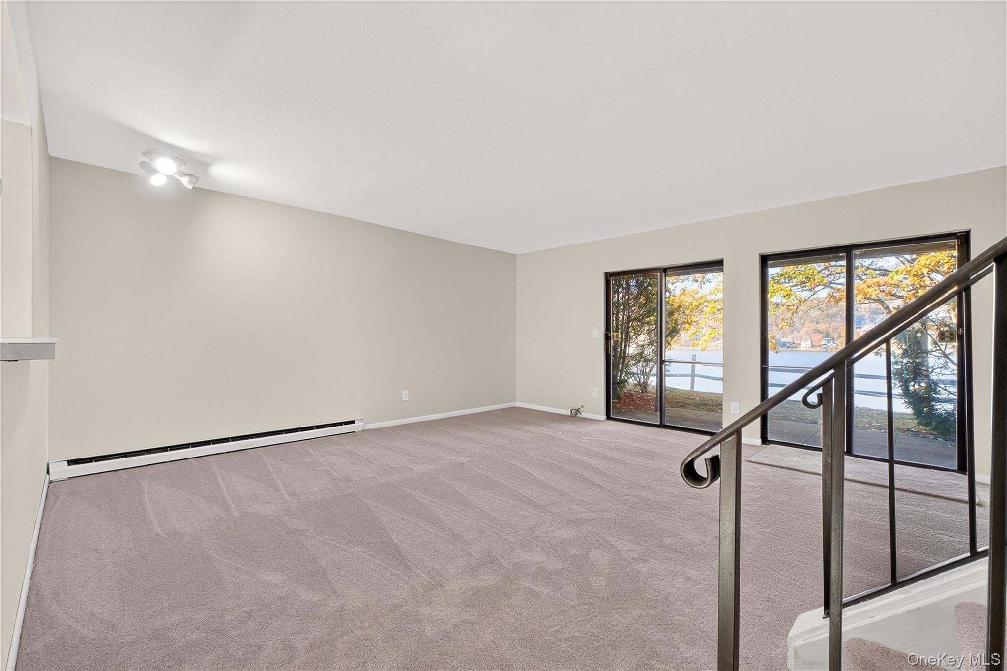 28 Hudson Heights Drive, Unit 28 Poughkeepsie, NY 12601 - Photo 7 of 50 a view of an empty room with a window
