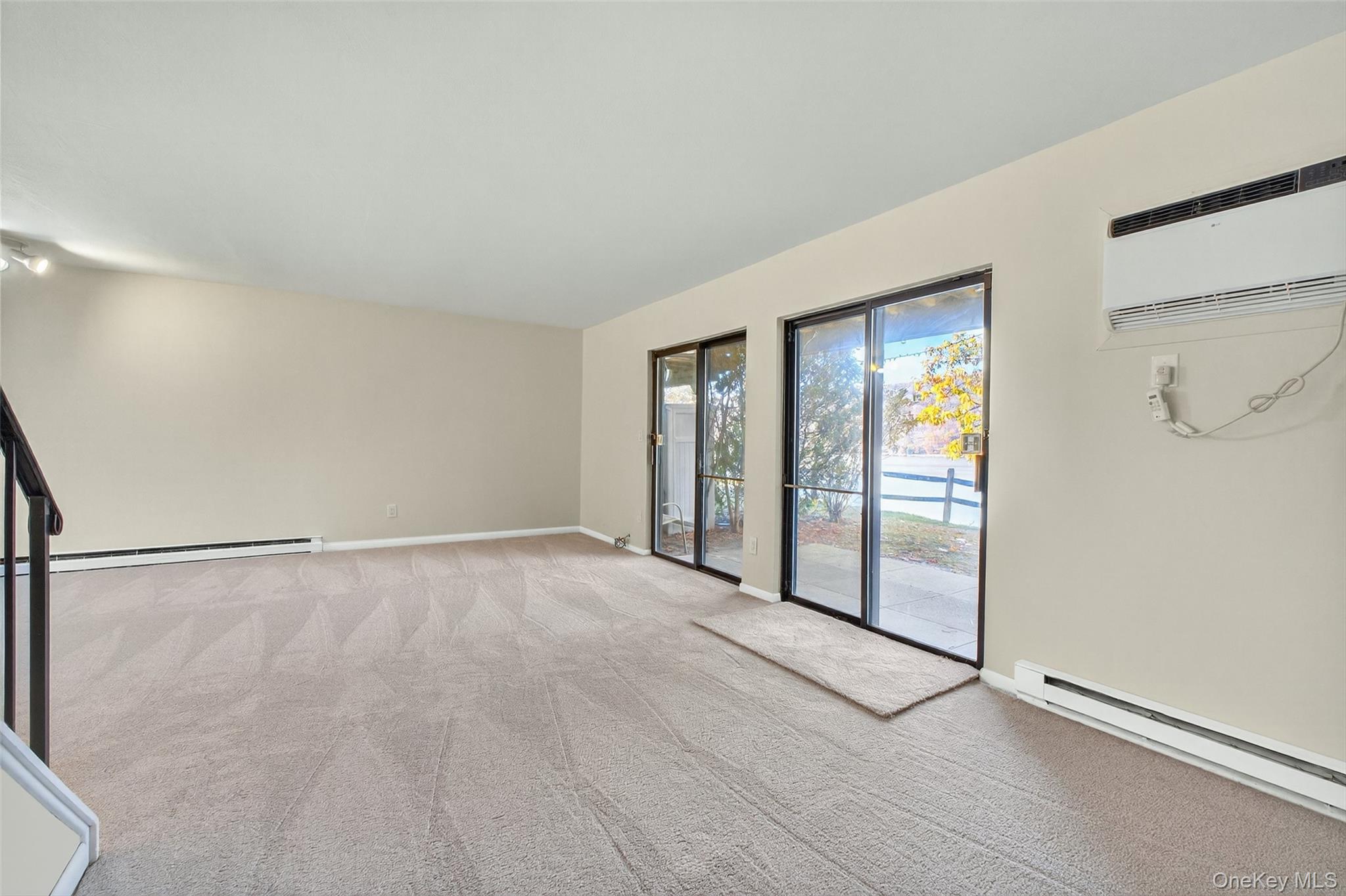 28 Hudson Heights Drive, Unit 28 Poughkeepsie, NY 12601 - Photo 9 of 50 an empty room with windows and closet