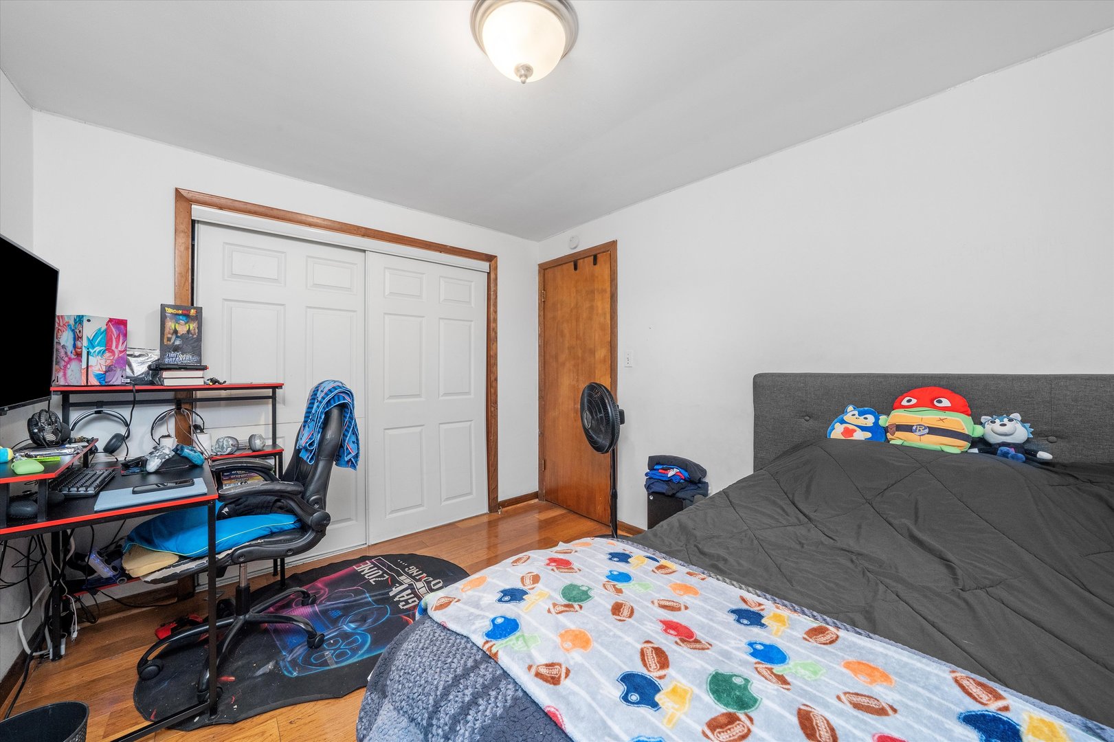 18508 Torrence Avenue Lansing, IL 60438 - Photo 24 of 39 a bedroom with bed and a window