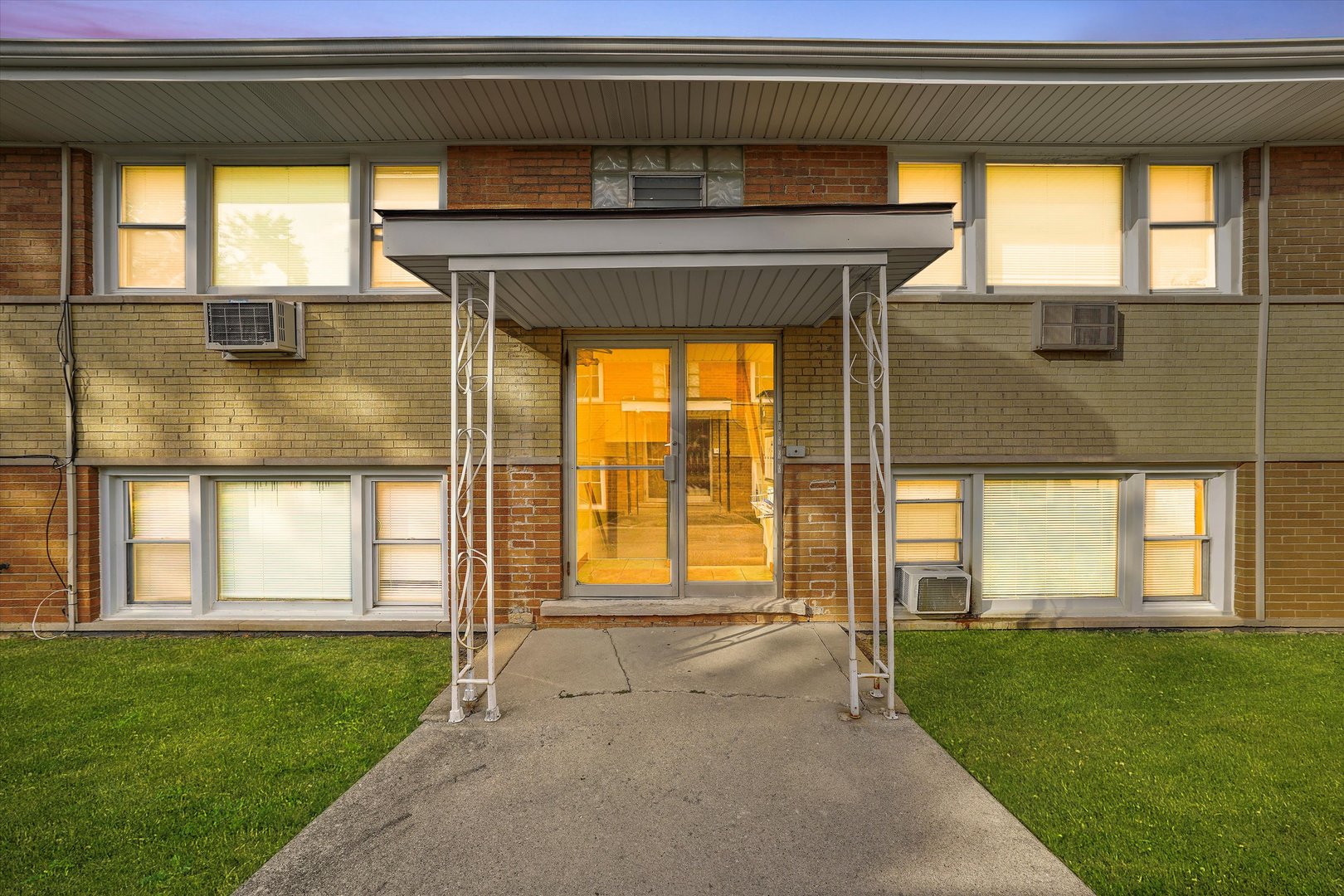 18508 Torrence Avenue Lansing, IL 60438 - Photo 39 of 39 a front view of a house with a yard