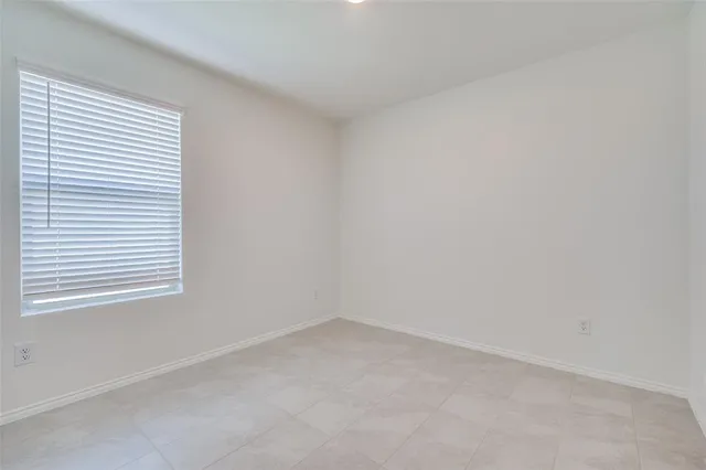 an empty room with a window