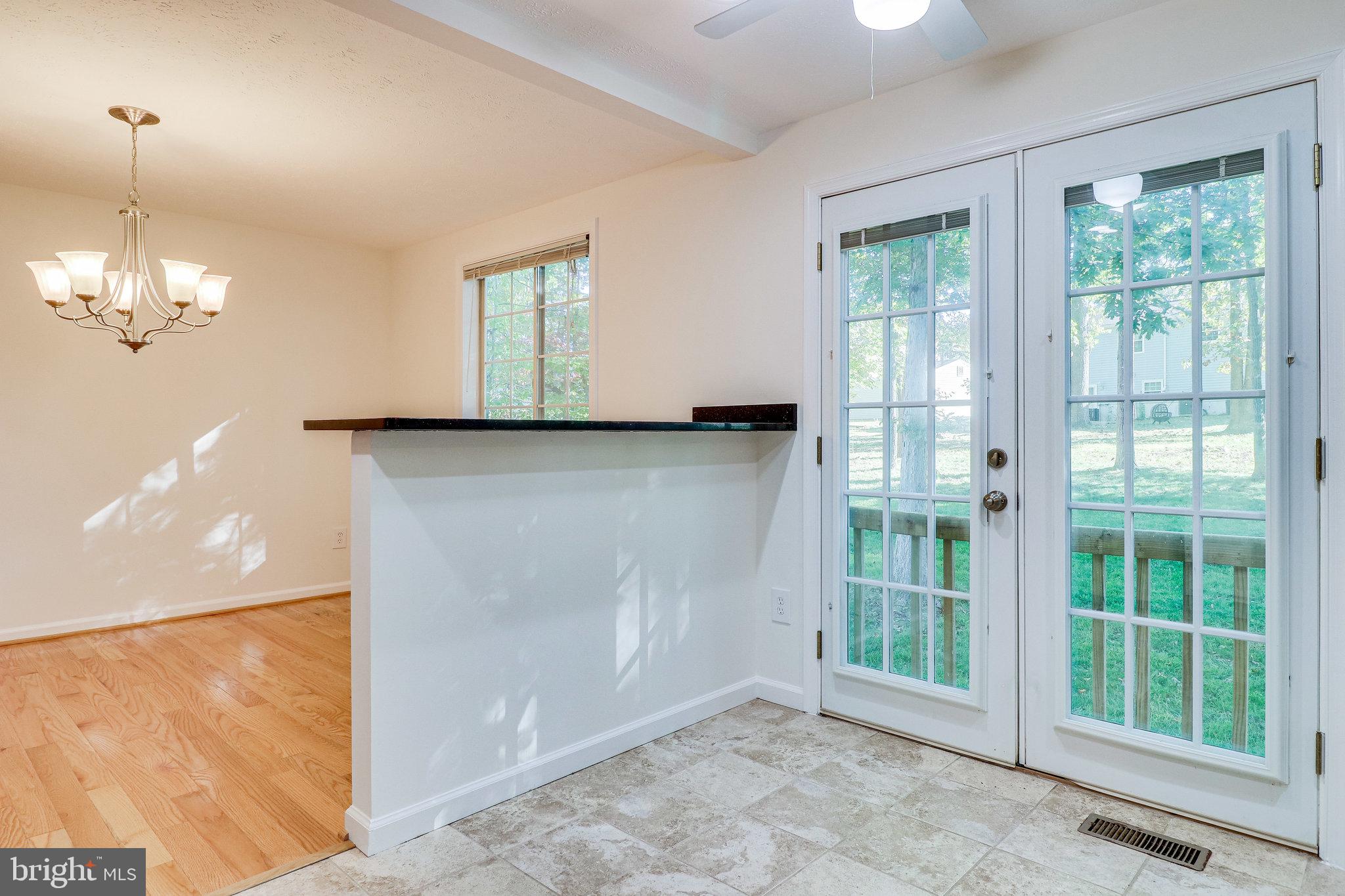 8071 Winding Way Court Springfield, VA 22153 - Photo 13 of 43 Serving Counter & Backyard Views