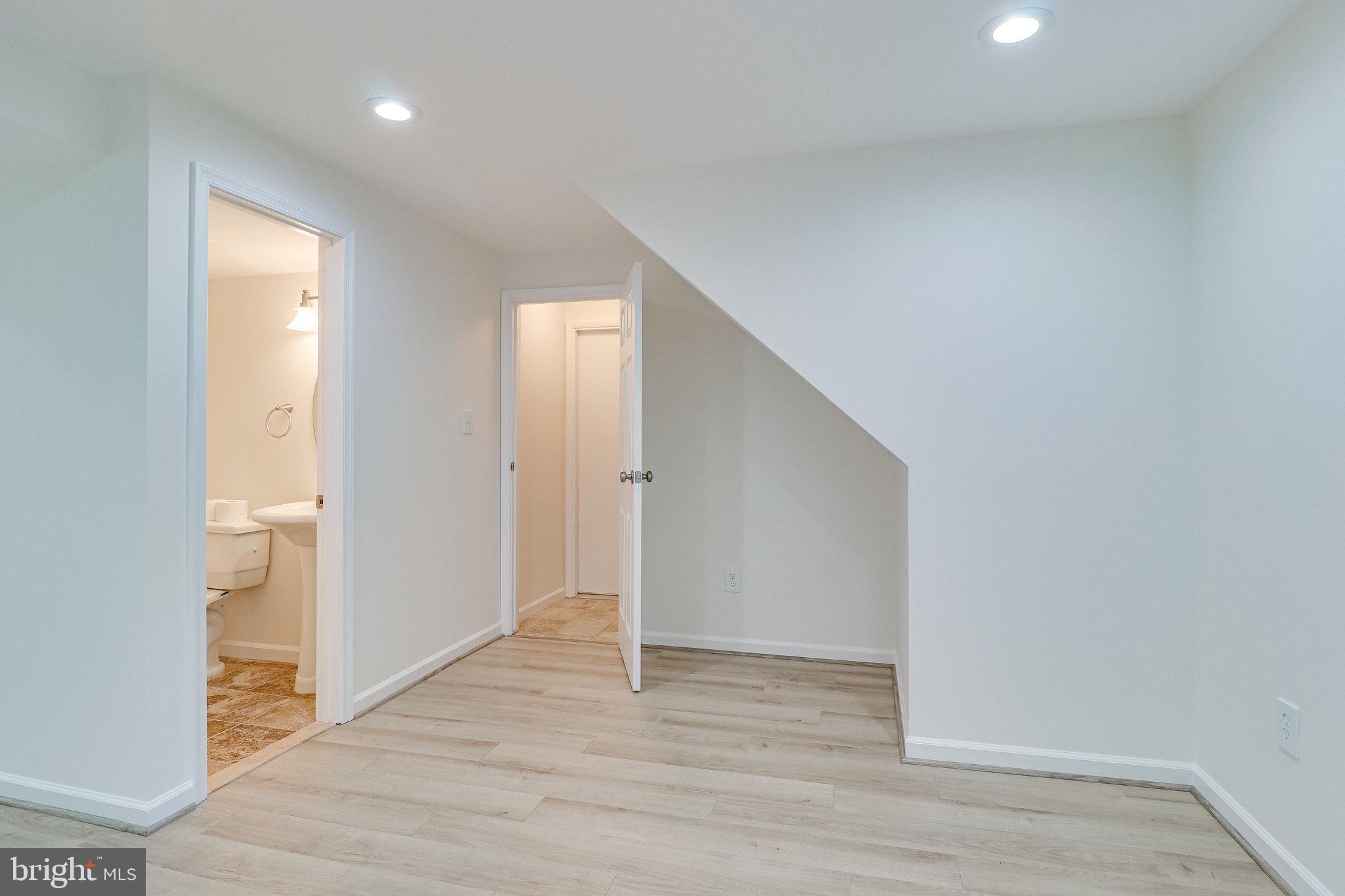8071 Winding Way Court Springfield, VA 22153 - Photo 35 of 43 Access to Half Bath and Garage