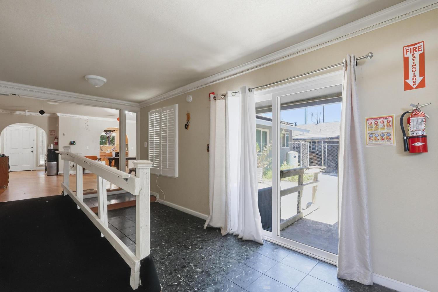 920 Bogue Road Yuba City, CA 95991 - Photo 14 of 26 Extra-wide hallway with outdoor access to patio, ramp and stairs