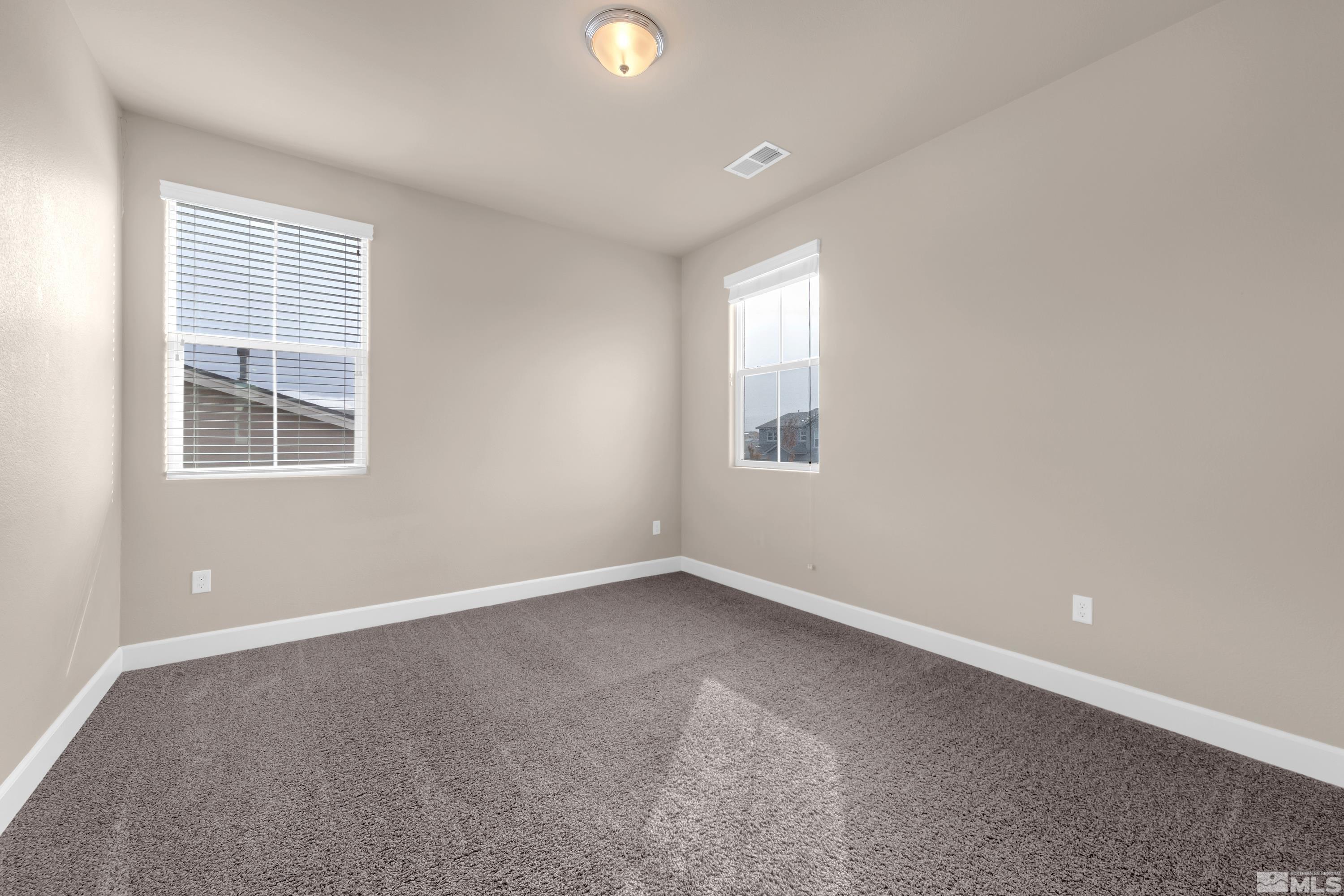 9352 Bay Drive Reno, NV 89506 - Photo 21 of 37 an empty room with windows