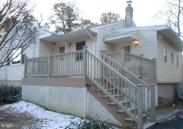 a view of a house with wooden floor