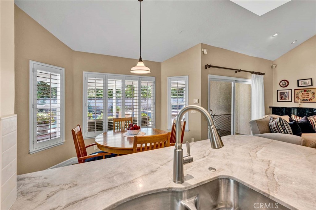 7710 East Strawberry Ridge Orange, CA 92869 - Photo 7 of 33 A spacious informal dining area overlooks the patio and pool.