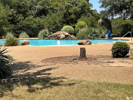 a view of a yard with a slide