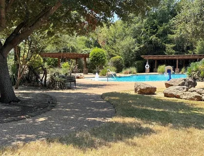 a view of a lake with a car parked