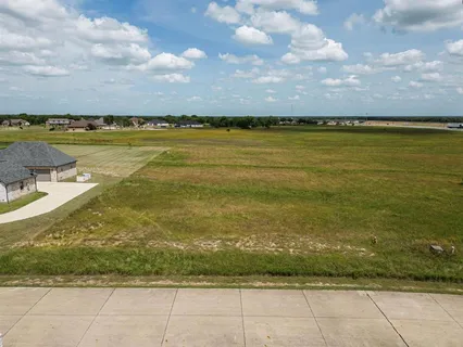 a view of a lake with houses in big room