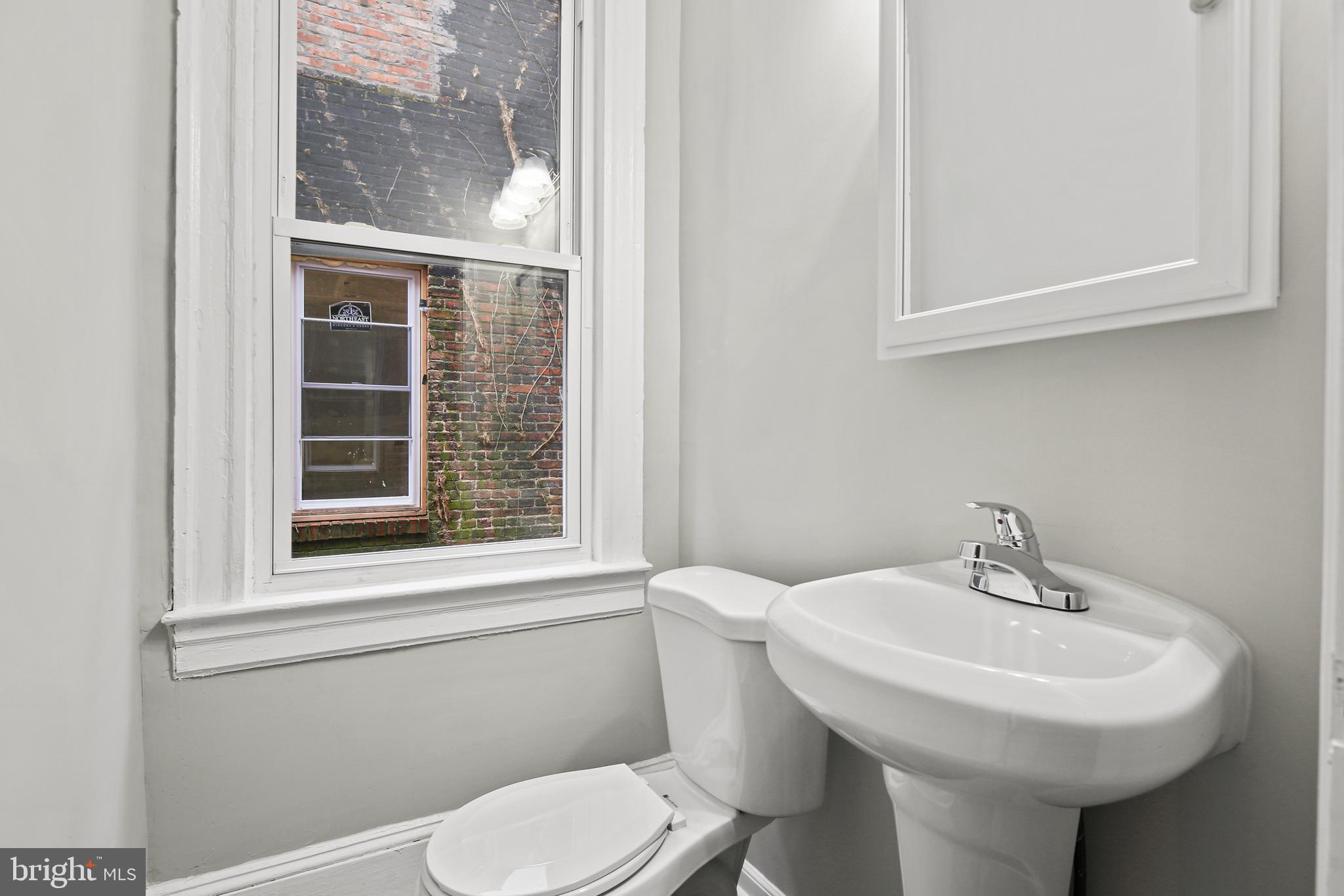 3908 Reisterstown Road Baltimore, MD 21215 - Photo 12 of 25 Main floor 1/2 bath !