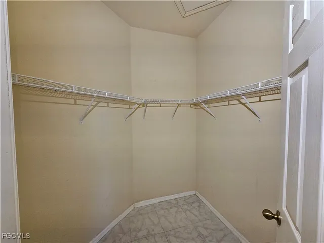 a view of a room with racks on the wall