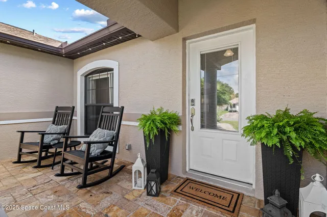 a workspace with furniture and a potted plant