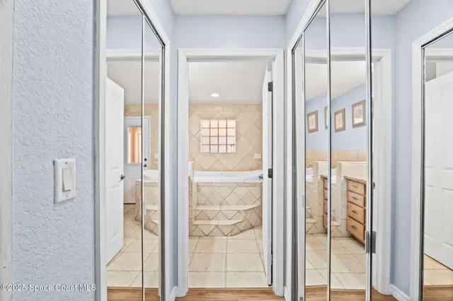 a view of a bathroom with a glass door