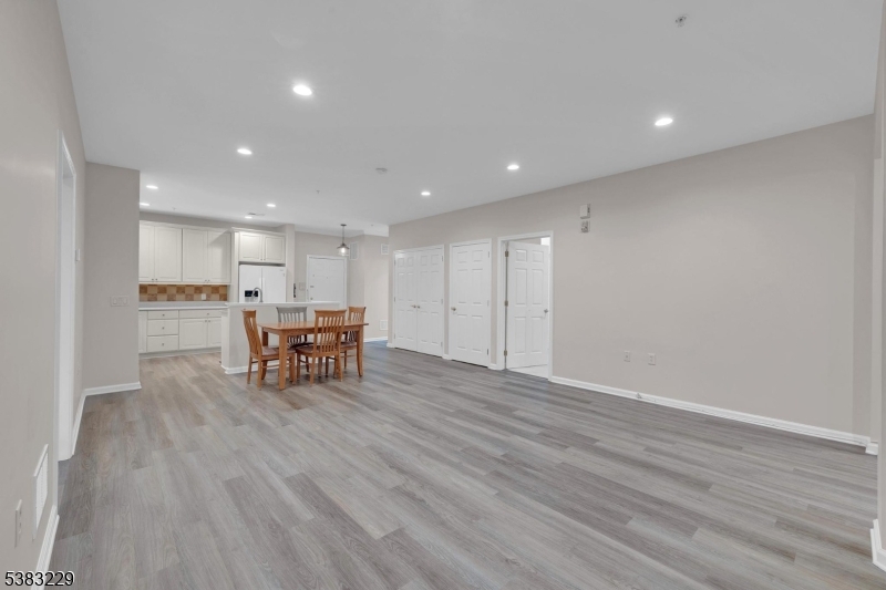 7 Ridgeview Lane, Unit 7 Mount Arlington, NJ 07856 - Photo 21 of 33 a kitchen with a table and chairs in it