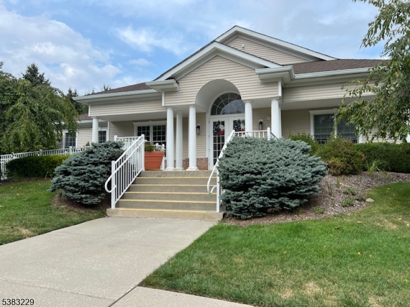 7 Ridgeview Lane, Unit 7 Mount Arlington, NJ 07856 - Photo 23 of 33 a front view of a house with a yard