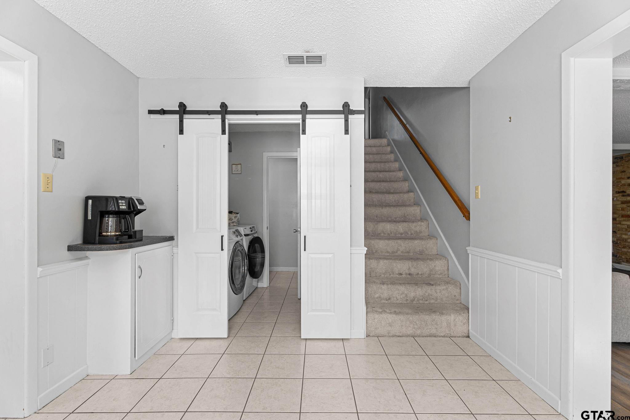 8224 Purdue Drive Tyler, TX 75703 - Photo 11 of 39 a view of a storage and utility room with stairs