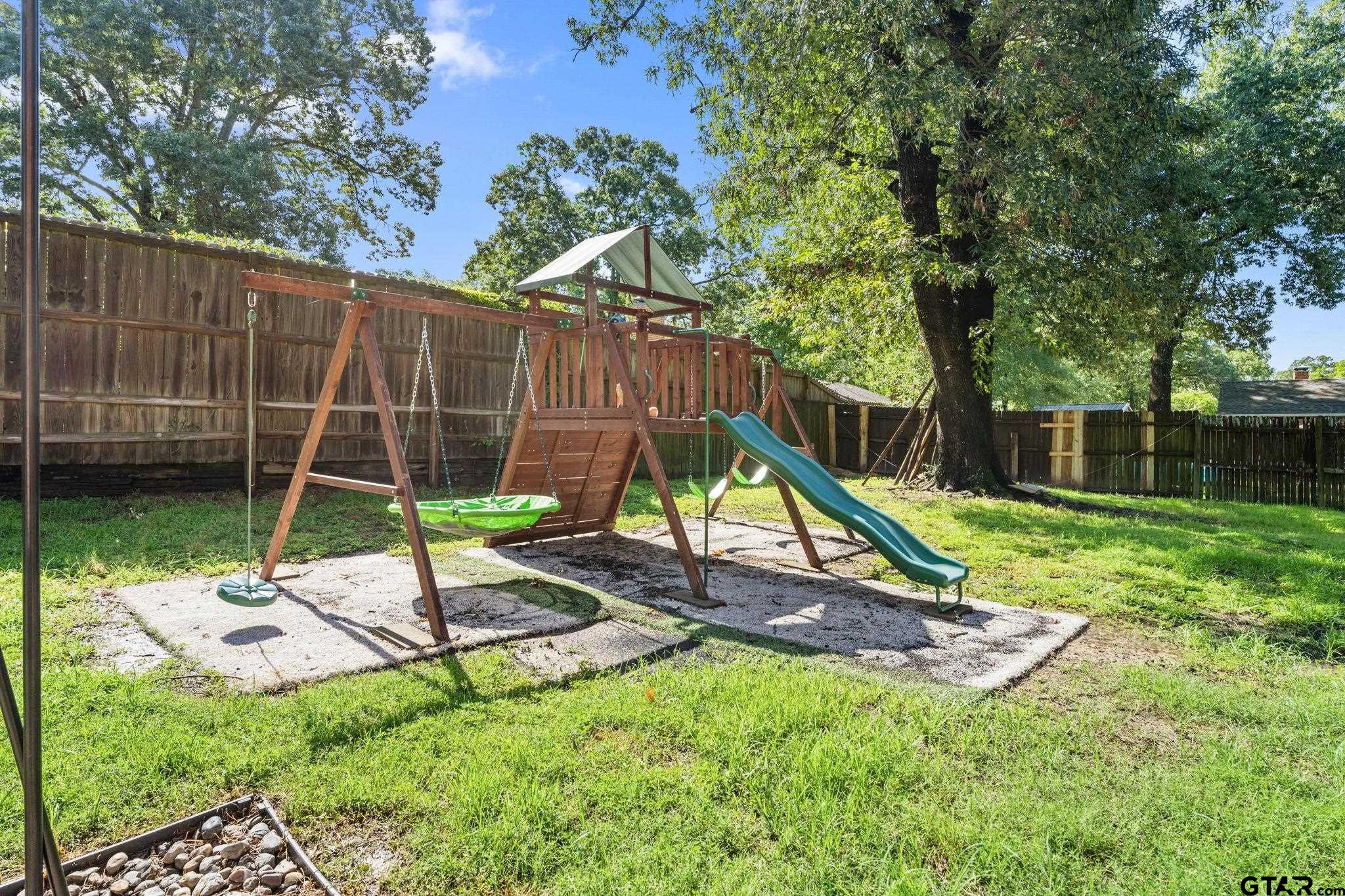 8224 Purdue Drive Tyler, TX 75703 - Photo 33 of 39 a view of a park with a slide