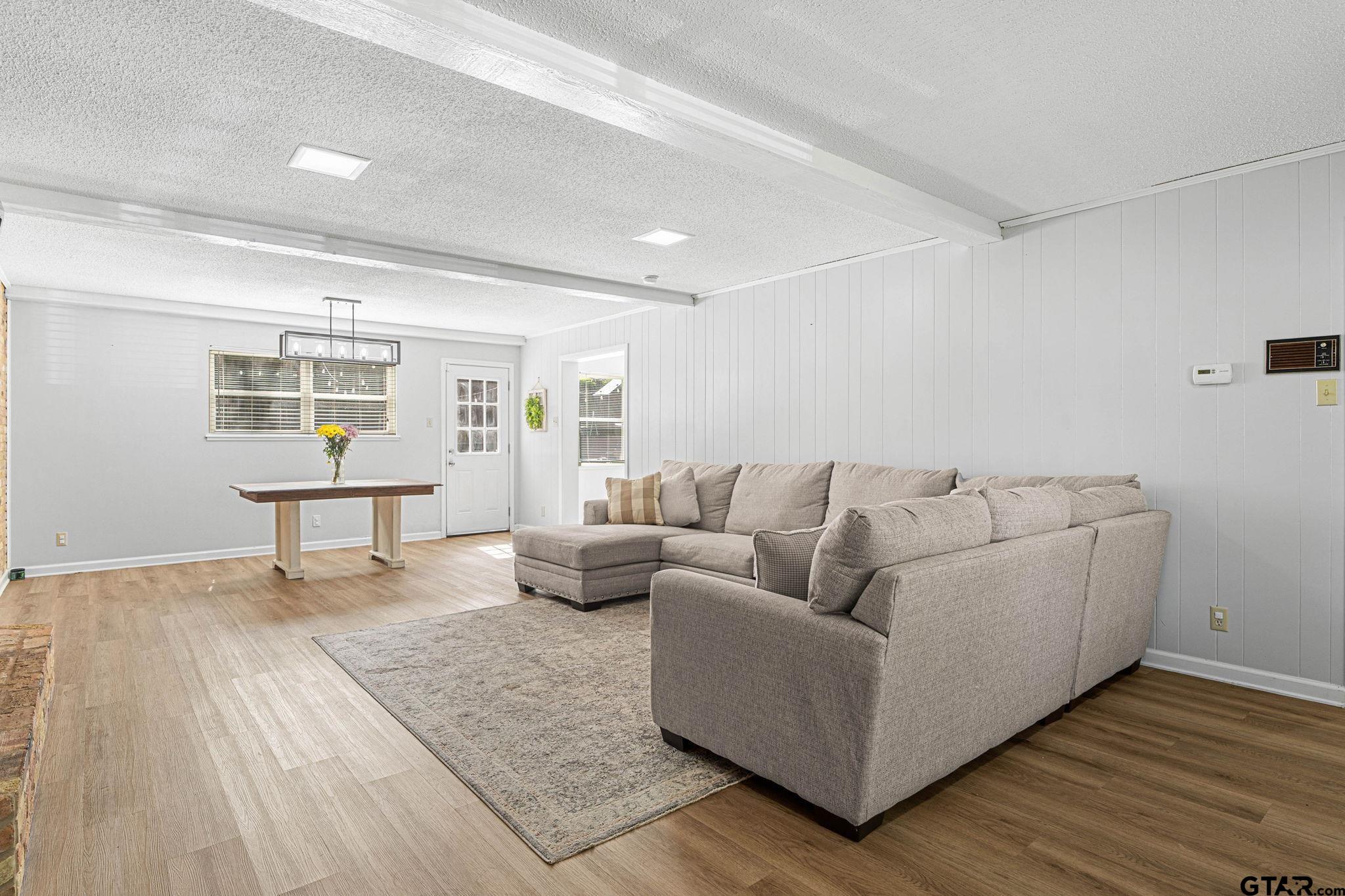 8224 Purdue Drive Tyler, TX 75703 - Photo 5 of 39 a living room with furniture and a window