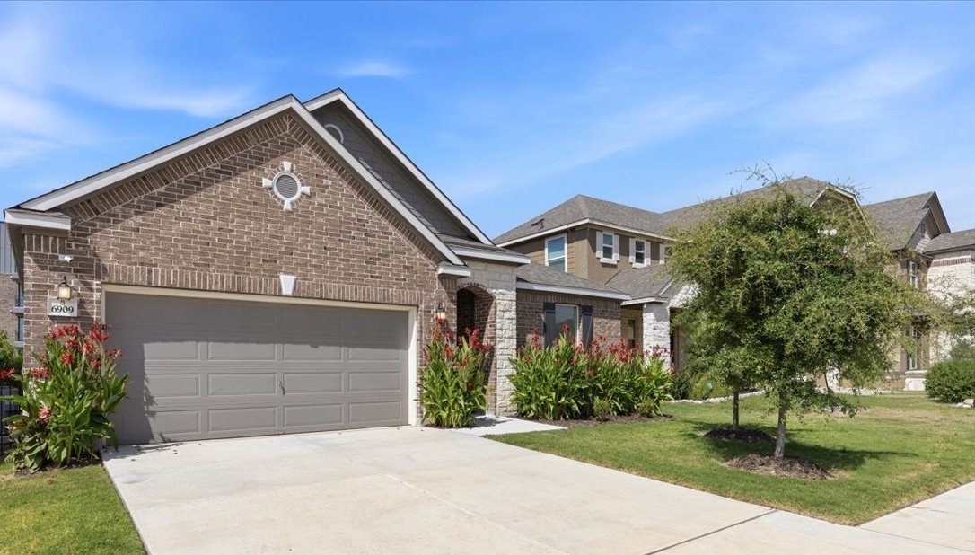 6909 Daniel Ranch Drive Austin, TX 78744 - Photo 1 of 24