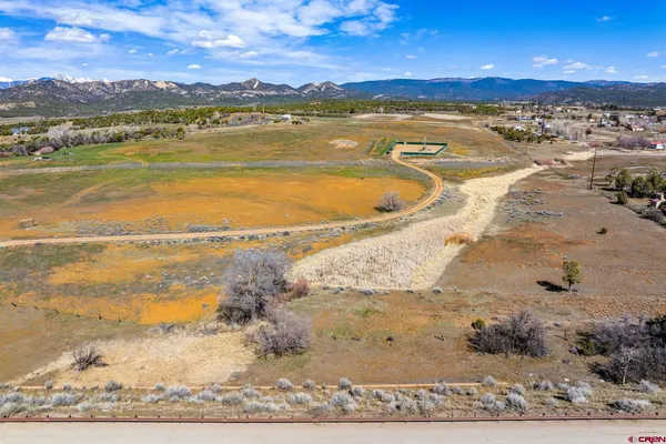 a view of an ocean and city