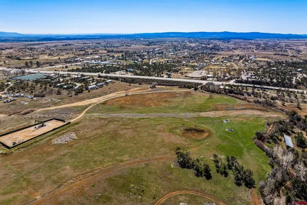 a view of an ocean and a mountain
