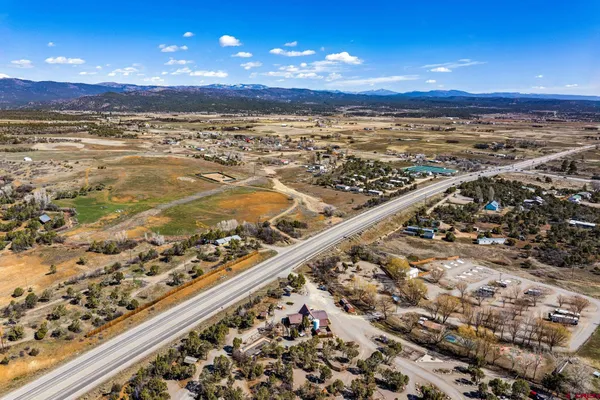 a view of a city with an ocean