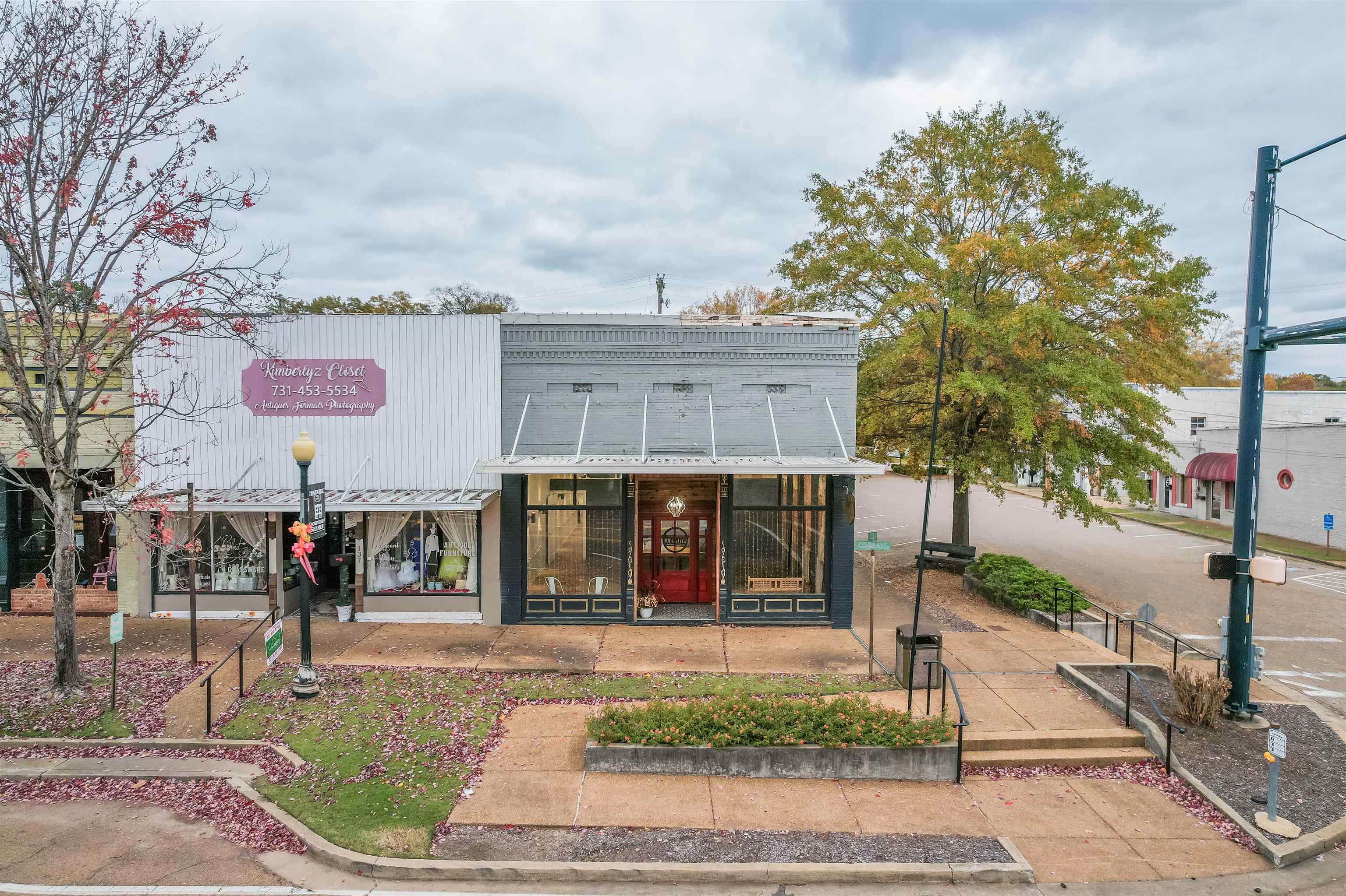 133 West Court Avenue Selmer, TN 38375 - Photo 3 of 28 a view of a street with houses