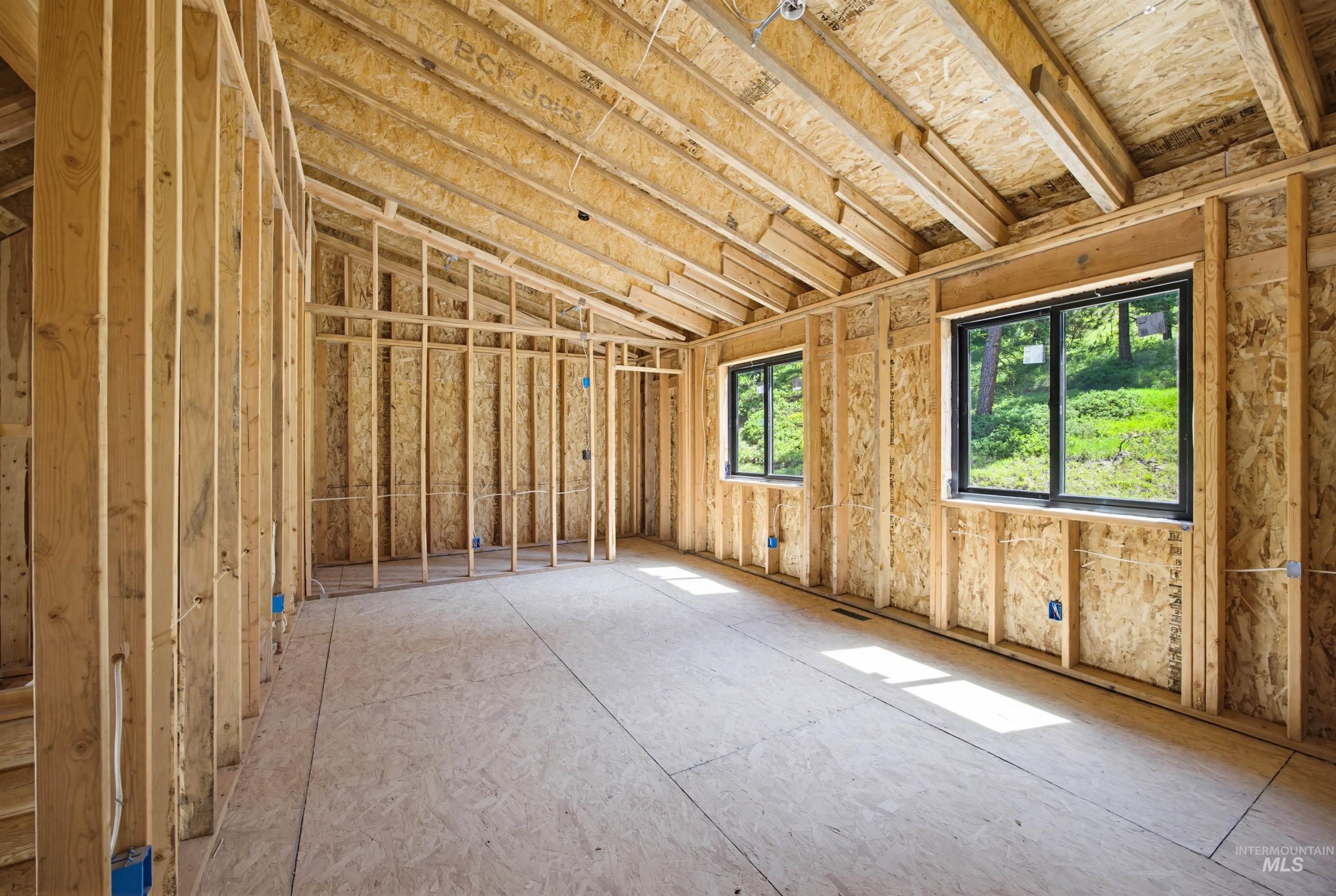 3322 Big Creek Road New Meadows, ID 83654 - Photo 34 of 50 Newly framed interior space featuring exposed wood studs, oriented strand board walls, and plywood subflooring