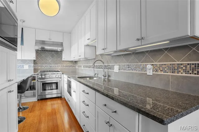 $335,000 | 4466 West Pine Boulevard, Unit 15F, St. Louis, MO 63108