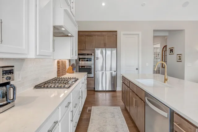 a view of a living room and dining room