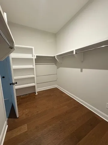 a bathroom with a shower and a bath tub