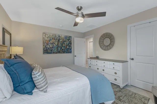 a view of entryway with wooden floor and stairs