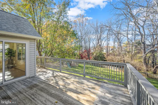 a view of a balcony with wooden floor