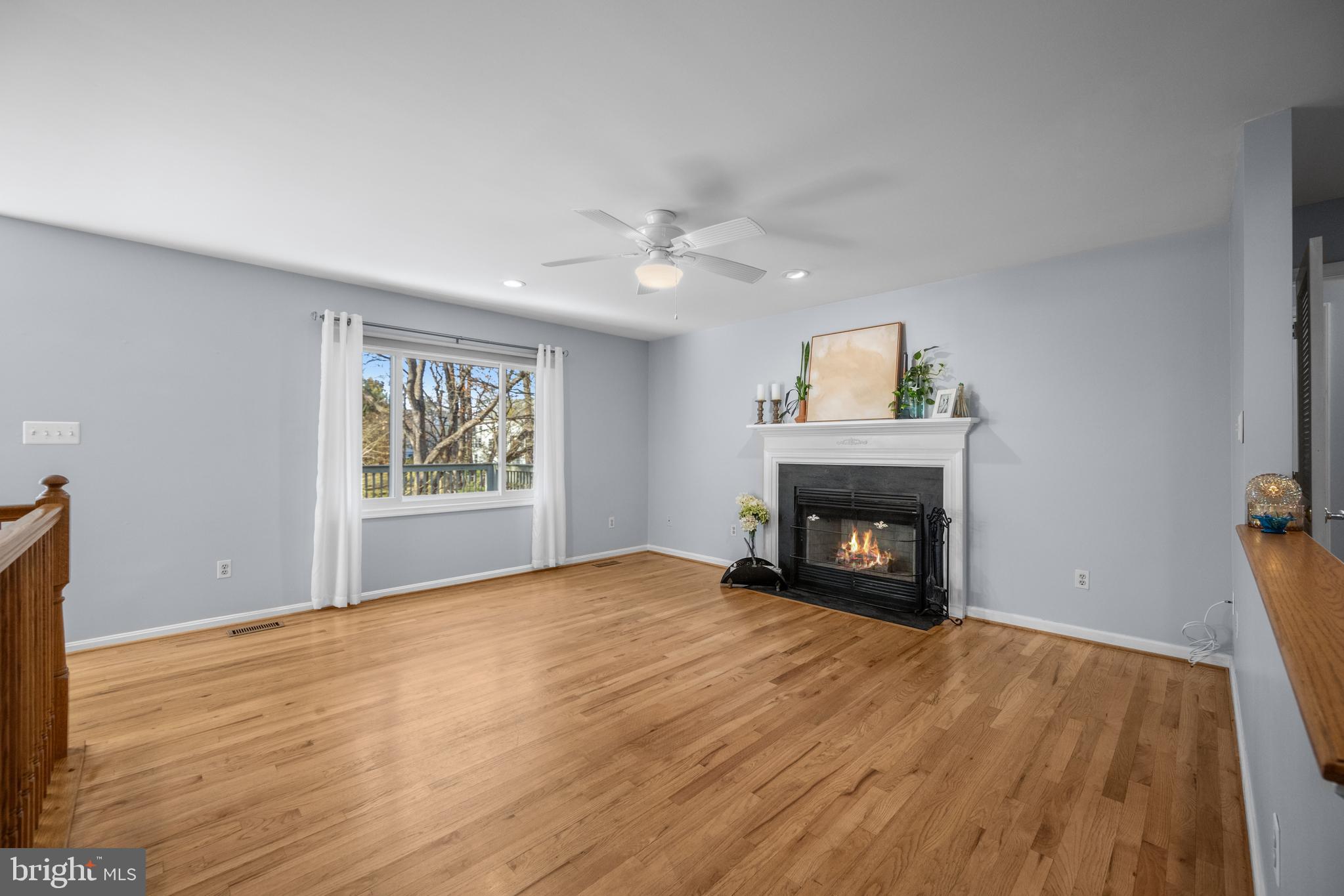 10781 Scaggsville Road Laurel, MD 20723 - Photo 7 of 44 Living room with wood burning fireplace