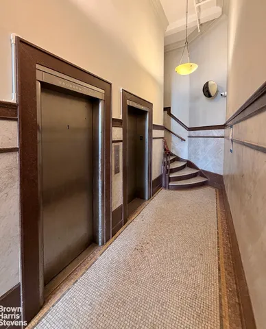 a view of hallway with washer and dryer