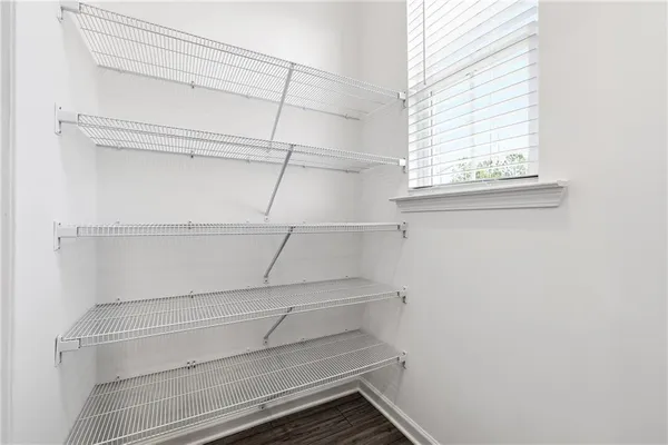 a view of an empty walk in closet